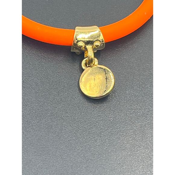 Marc by Marc Jacobs Orange
Silicone Stretch Bracelet with Gold
Charm NWT - Picture 3 of 6